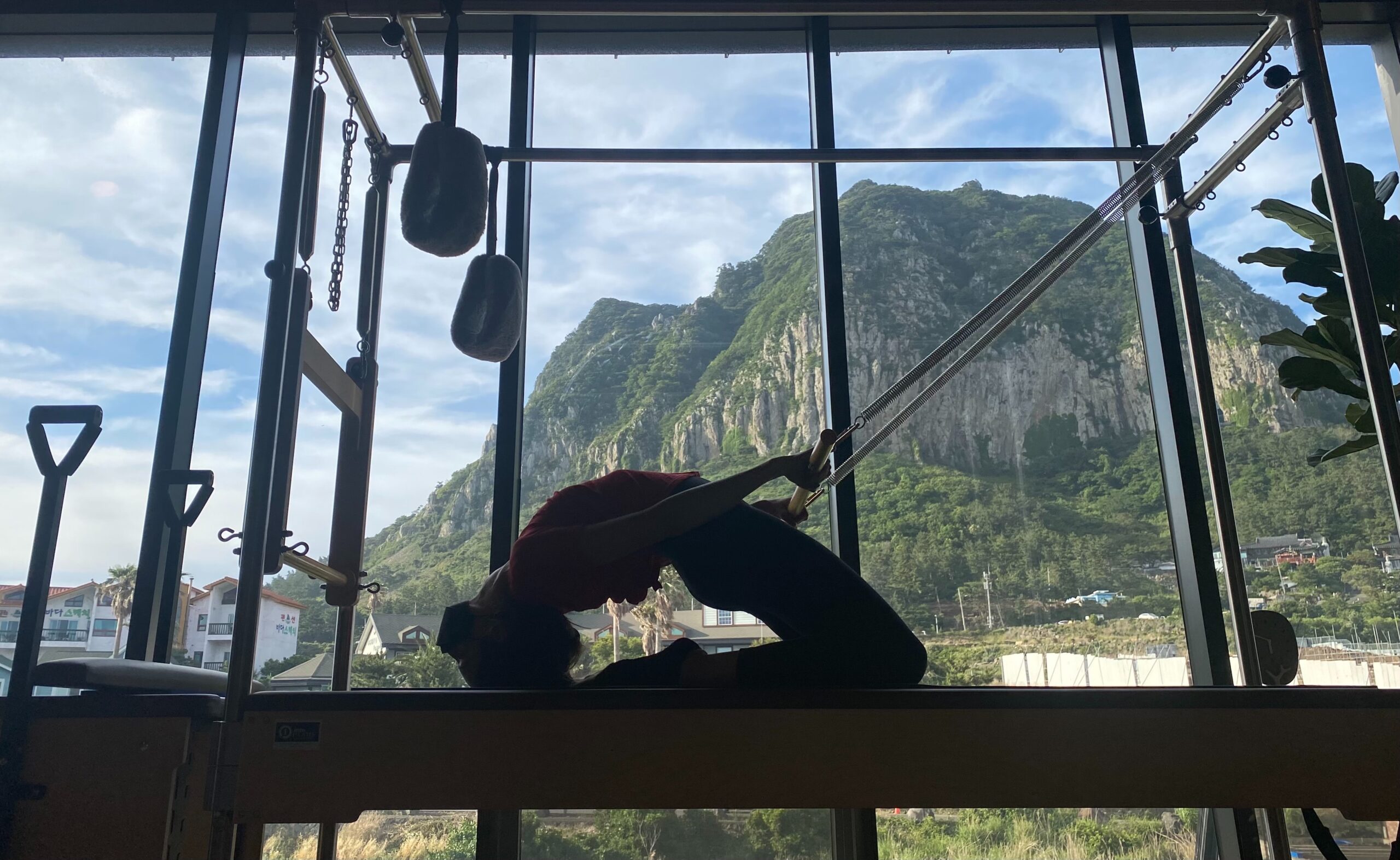 woman on Pilates reformer